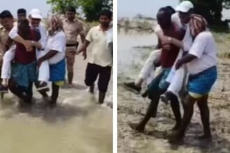 कांग्रेस सांसद तारिक अनवर का वीडियो वायरल, कीचड़ और पानी से बचने के लिए युवक के कंधे पर हुए सवार