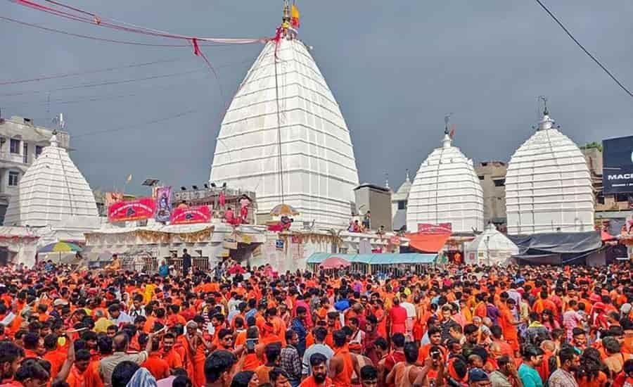 देवघर के बैद्यनाथ धाम मंदिर में भक्तों को दिये गये पुराने शीघ्रदर्शनम कूपन, अधिकारी बोले- एजेंसी को जारी होगा शॉ-कॉज